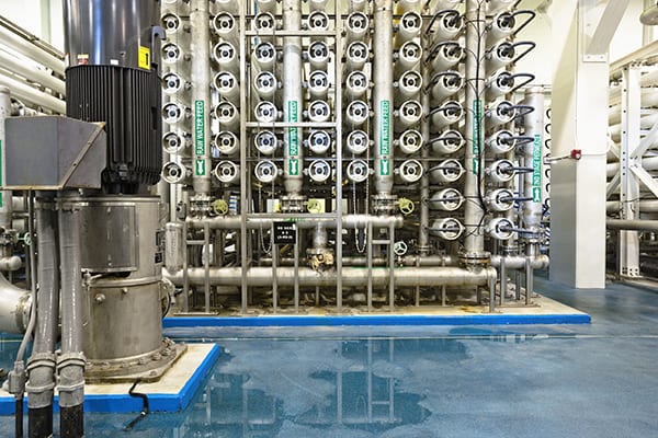 A photo of a bank of reverse osmosis units at a public water utility plant.