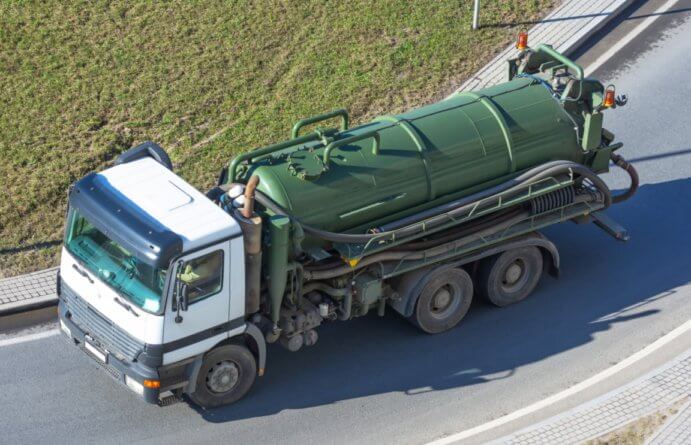 Photo of a heavy wastewater truck in use for brine management