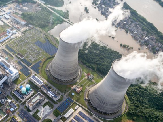 Photo of cooling towers in a power plant facility