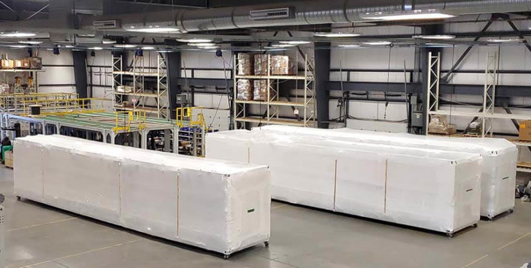 Photo of full-scale SaltMaker MVR plants packaged for shipment