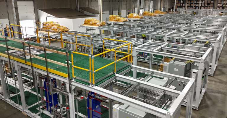 Factory-built semiconductor wastewater treatment systems in production at Saltworks' manufacturing facility.