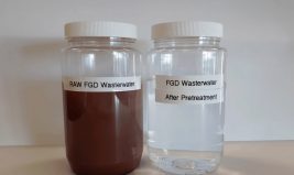 Comparison of FGD wastewater, one container is brown, murky and the second is clear water.
